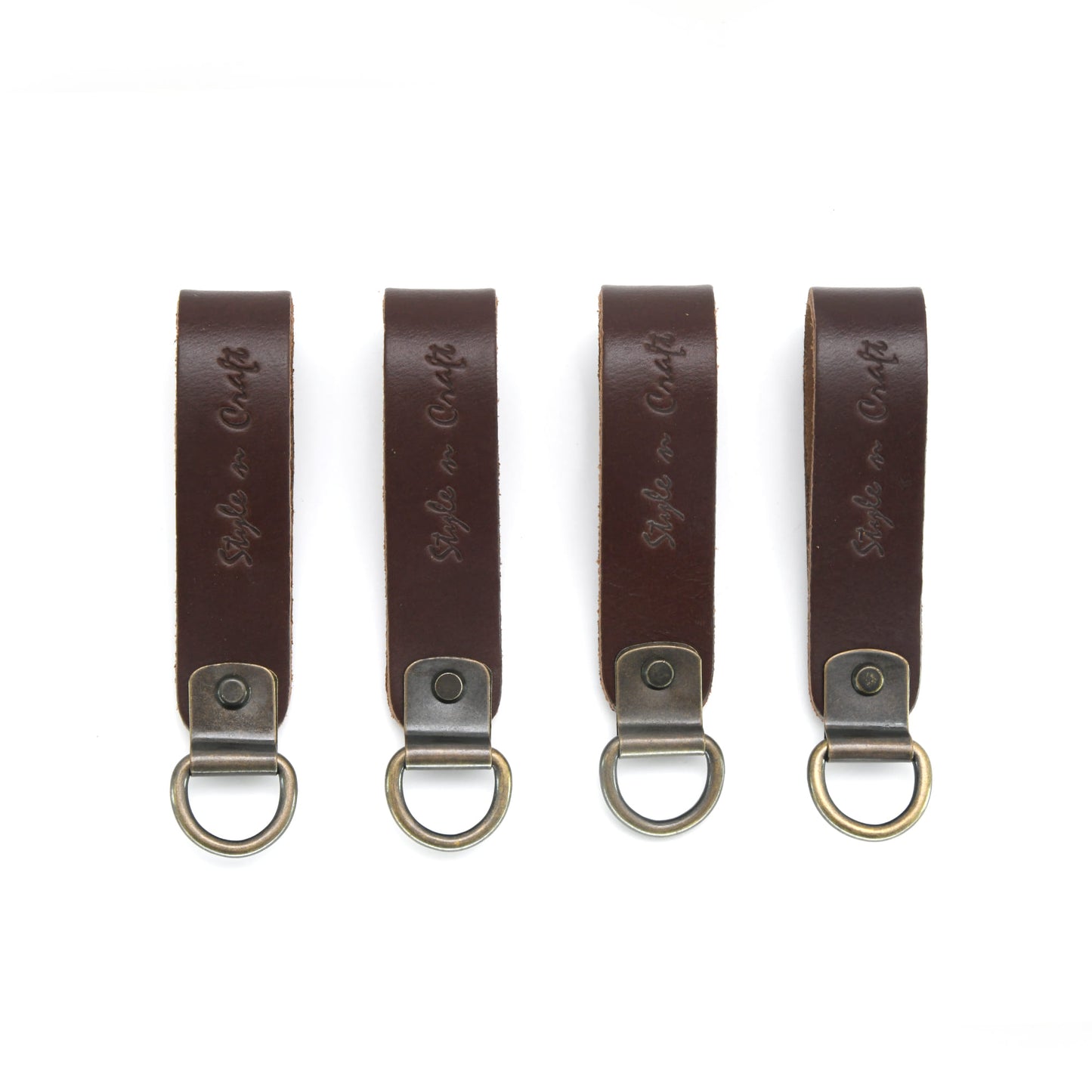 Style n Craft 98200 - Leather D-Ring Loop Set (4 Pcs) for Suspender Attachment in Dark Tan Color - Front View. Each Set Contains 4 Leather Loops attached to the D-ring with a metal plate