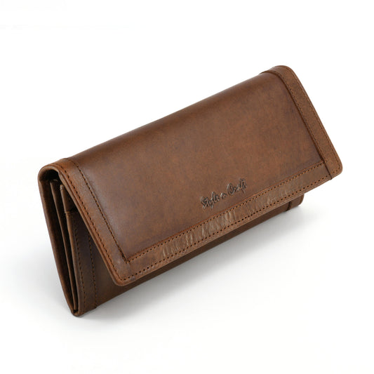 Style n Craft 391106 Ladies Long Clutch Wallet in Oak Color Leather with a Leather Frame on the Outside - Front Angled View Closed