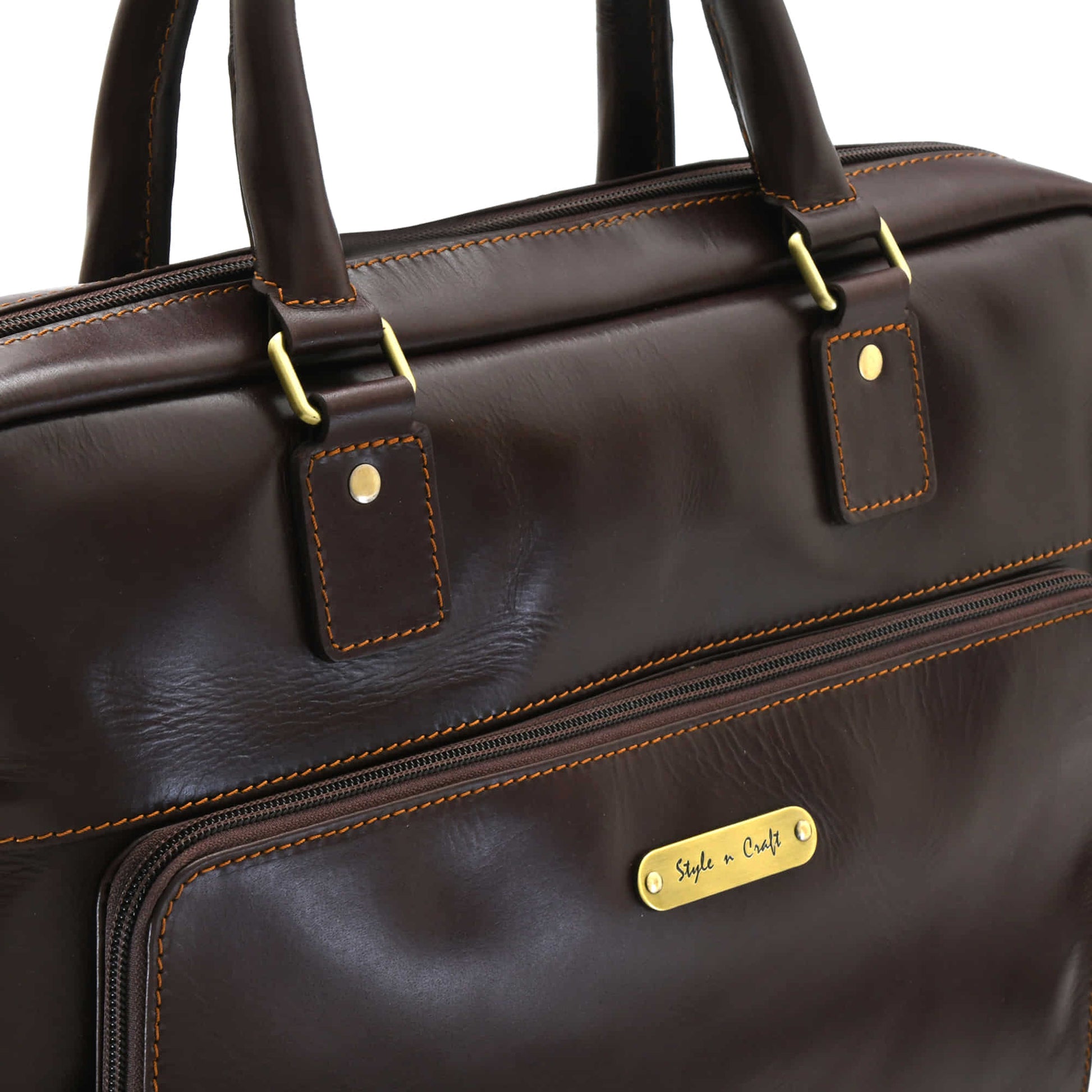 Style n Craft 392009 Men's Portfolio Briefcase Bag in Full Grain Dark Brown Leather - Front Angled Profile View showing the Logo on the External Zippered Pocket