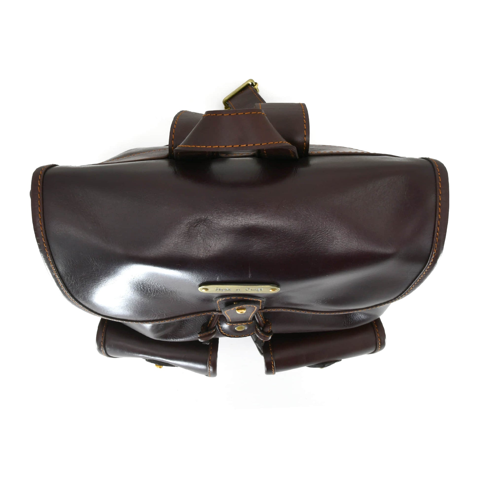 Style n Craft 392151 Backpack in Full Grain Dark Brown Leather, Medium Size - Top View Showing Top Flap, 2 Front Pockets & Leather Hand Carry Strap