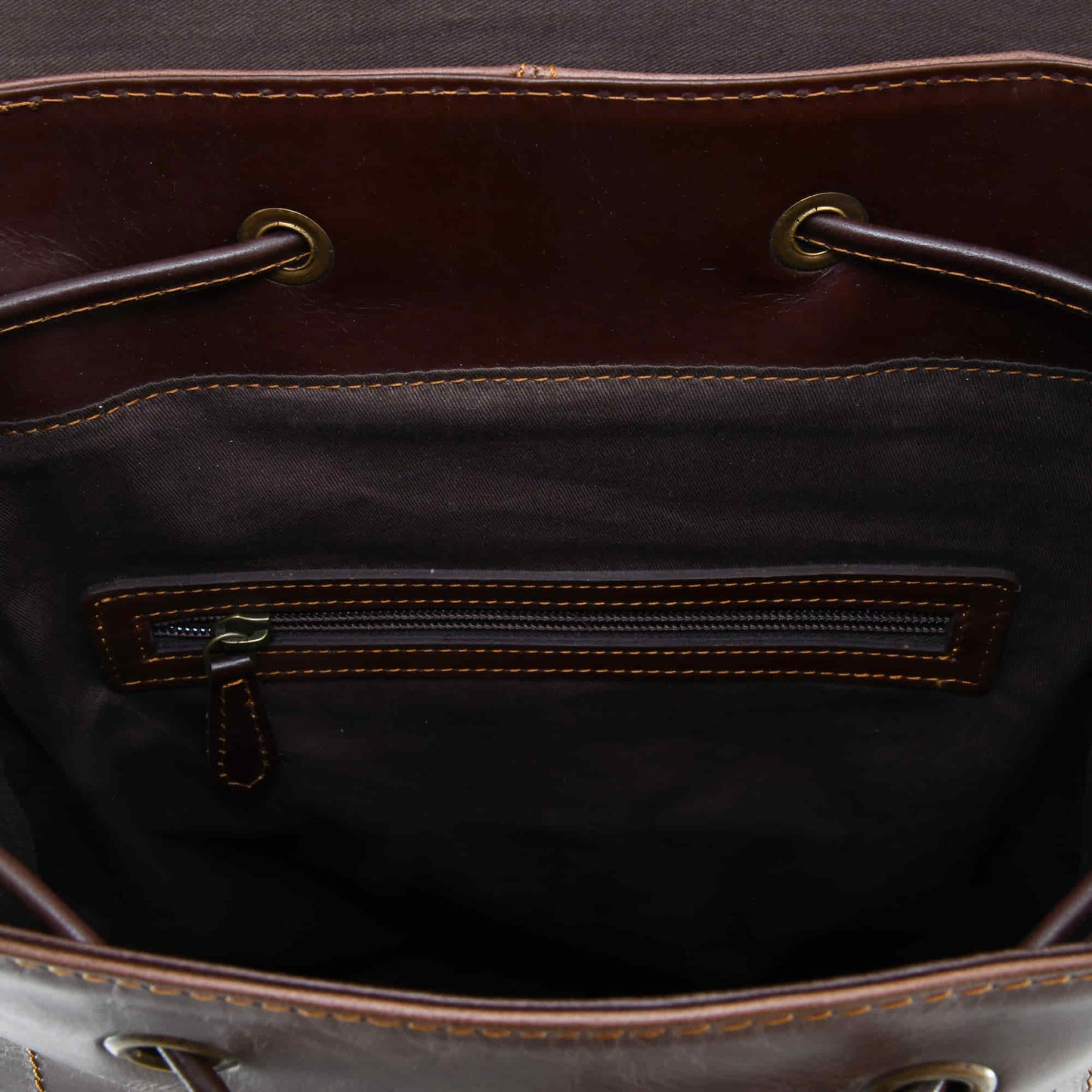 Style n Craft 392152 Tall Backpack in Light & Dark Brown Combination Full Grain Leather - Interior view of the bag showing the zipper pocket on the back wall of the backpack