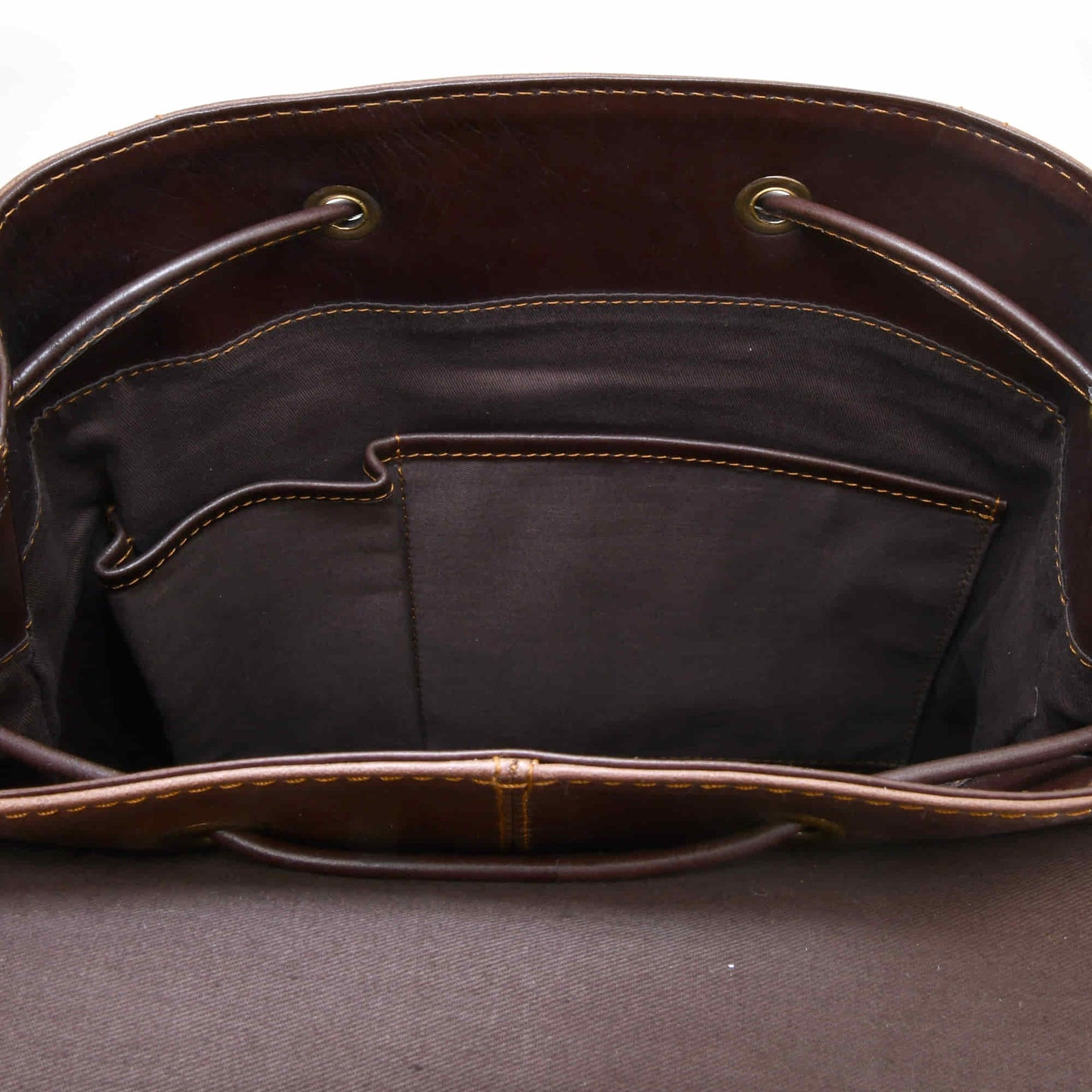 Style n Craft 392152 Tall Backpack in Light & Dark Brown Combination Full Grain Leather - Interior view of the bag showing the 2 smaller open pockets on the front wall of the backpack