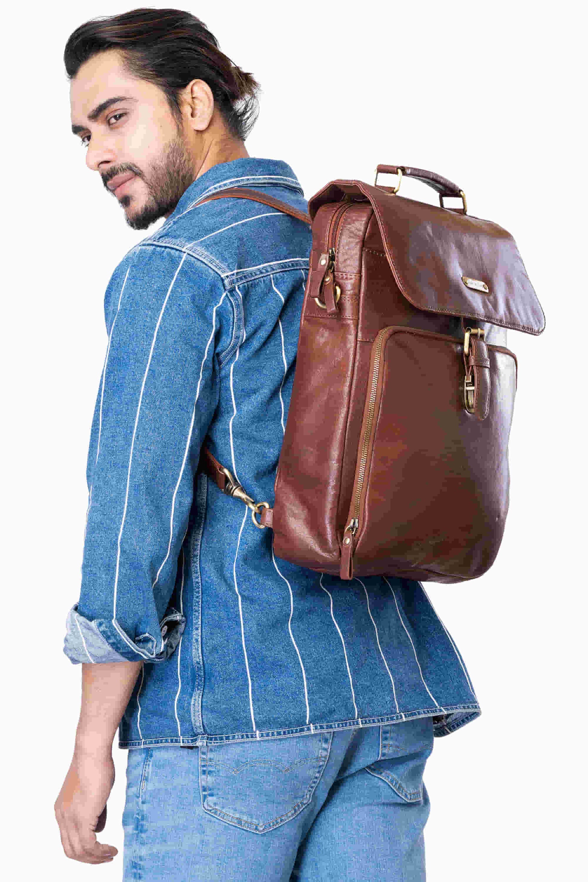 Style n Craft 392600 Cross Body Messenger Bag & Backpack in Full Grain Dark Brown Vintage Leather - in use as a backpack - side angled view