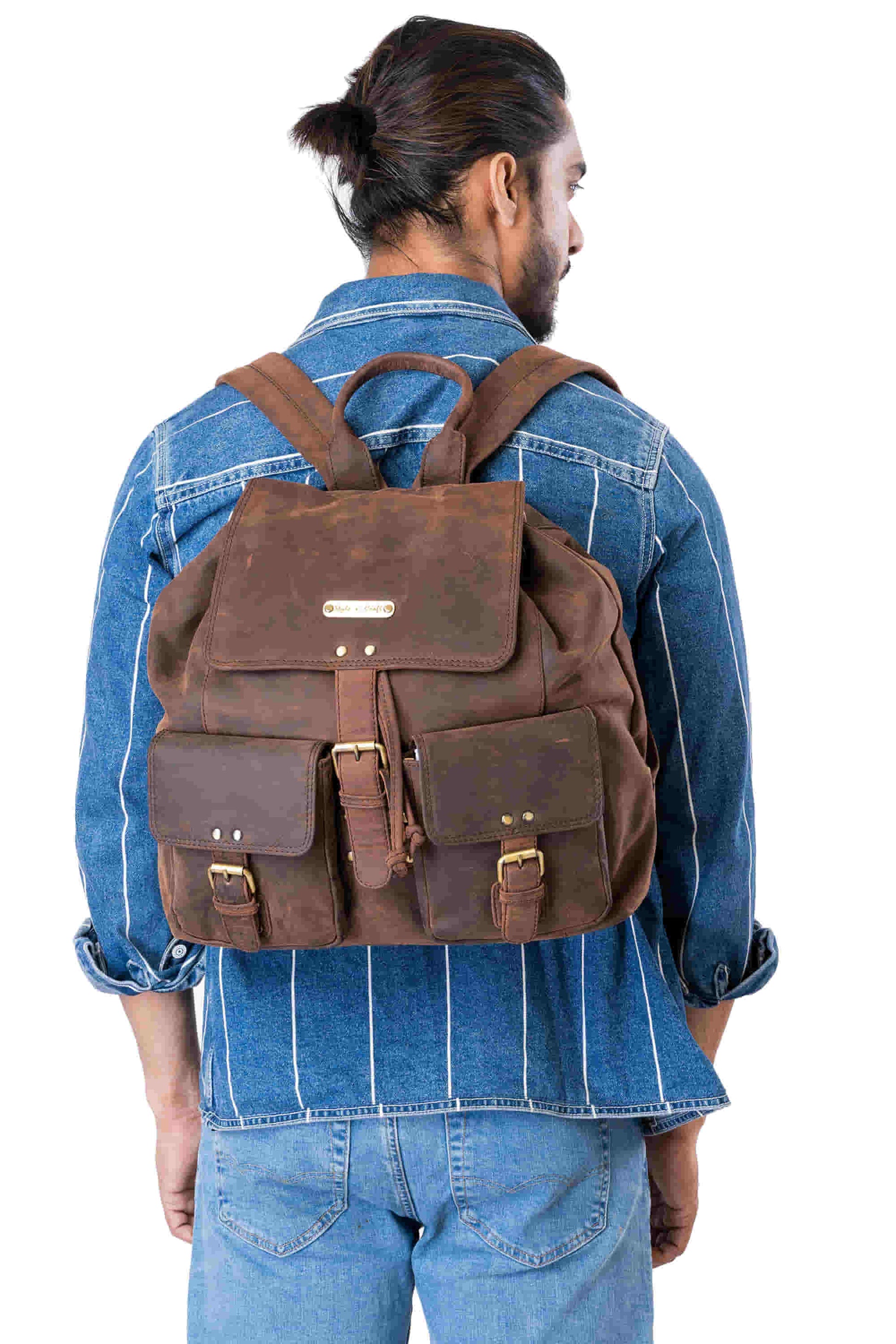 Style n Craft 392650 Backpack in Full Grain Dark Brown Hunter Leather - in use - carrying the backpack on the back using the leather shoulder straps