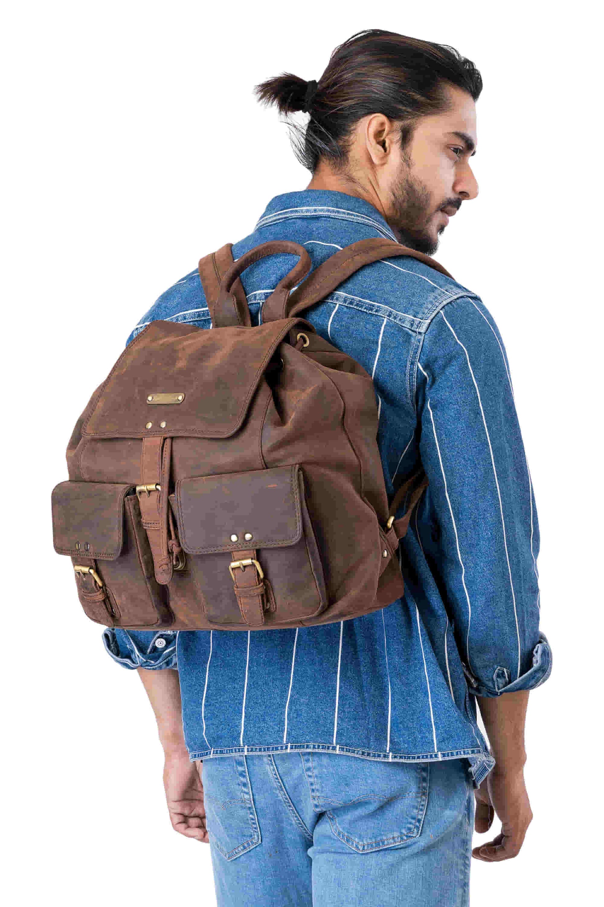 Style n Craft 392650 Backpack in Full Grain Dark Brown Hunter Leather - in use - carrying the backpack on the back using the leather shoulder straps - another view